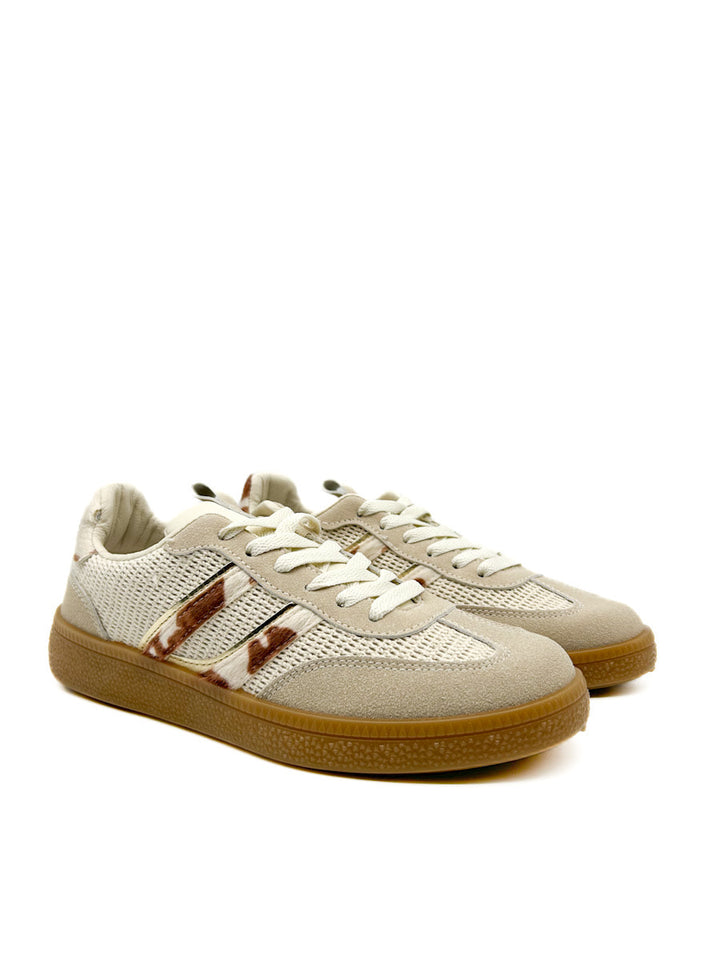 Zapatilla deportiva retro con estampado de piel de vaca