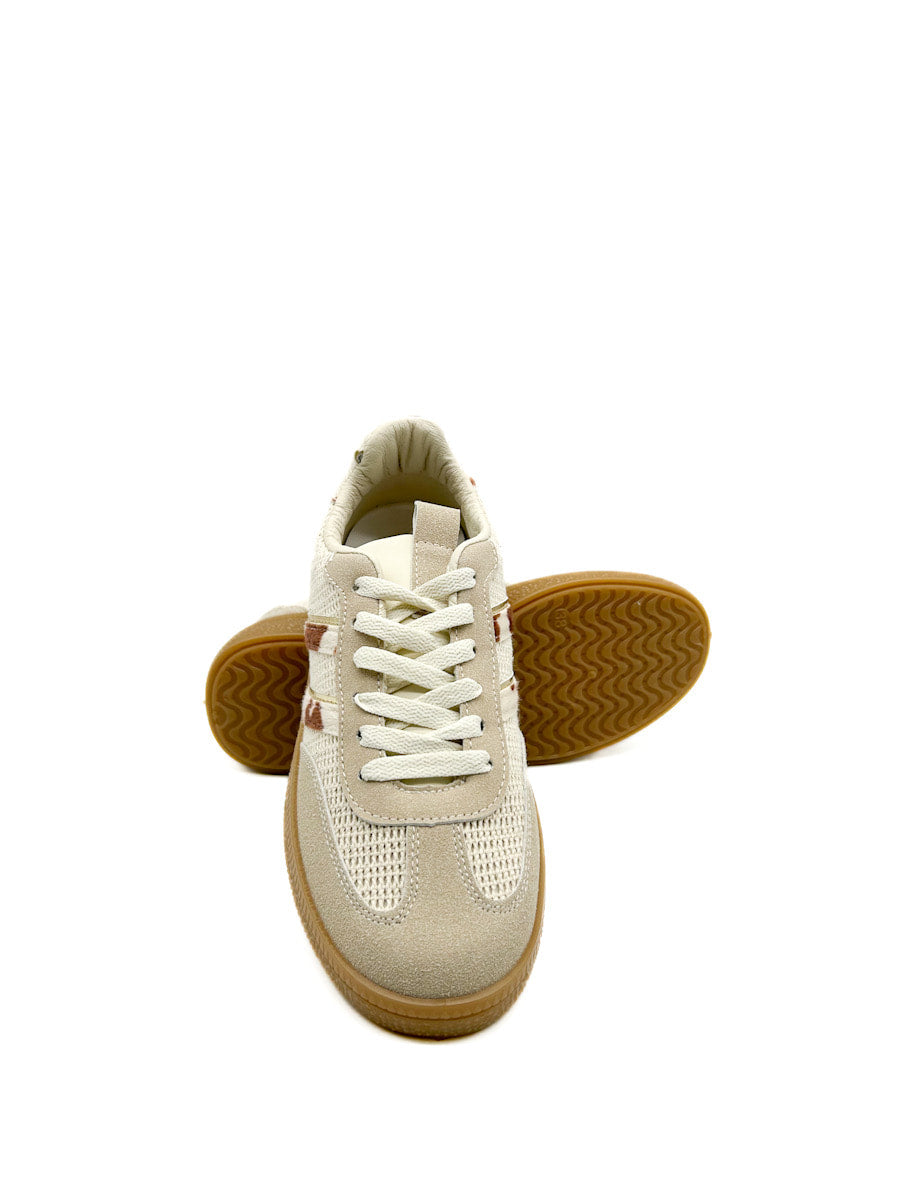 Zapatilla deportiva retro con estampado de piel de vaca