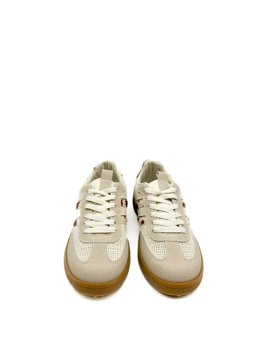Zapatilla deportiva retro con estampado de piel de vaca