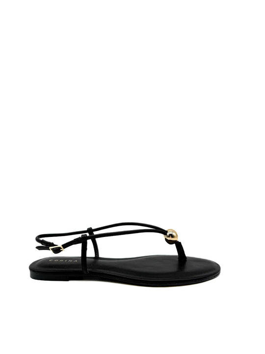 Sandalias planas de dedo Corina con esfera dorada.