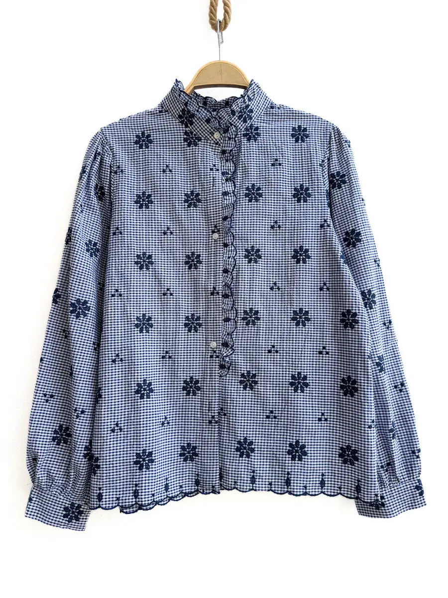 Blusa de cuadros con bordado floral Azul