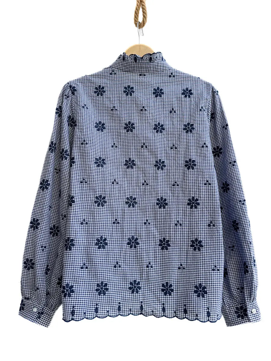 Blusa de cuadros con bordado floral