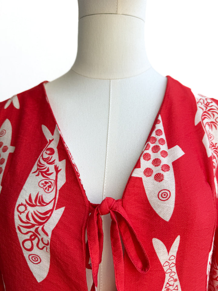 Conjunto peces rojo