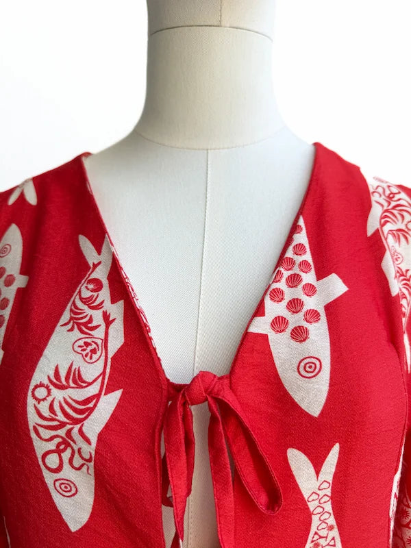 Conjunto peces rojo