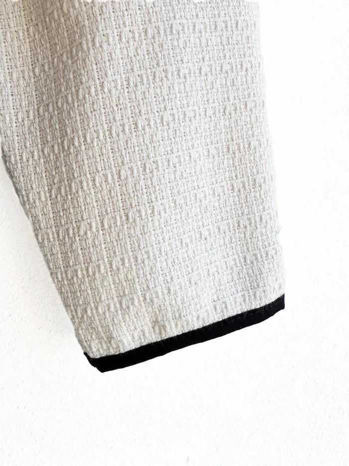 Chaqueta corta con lazo decorativo