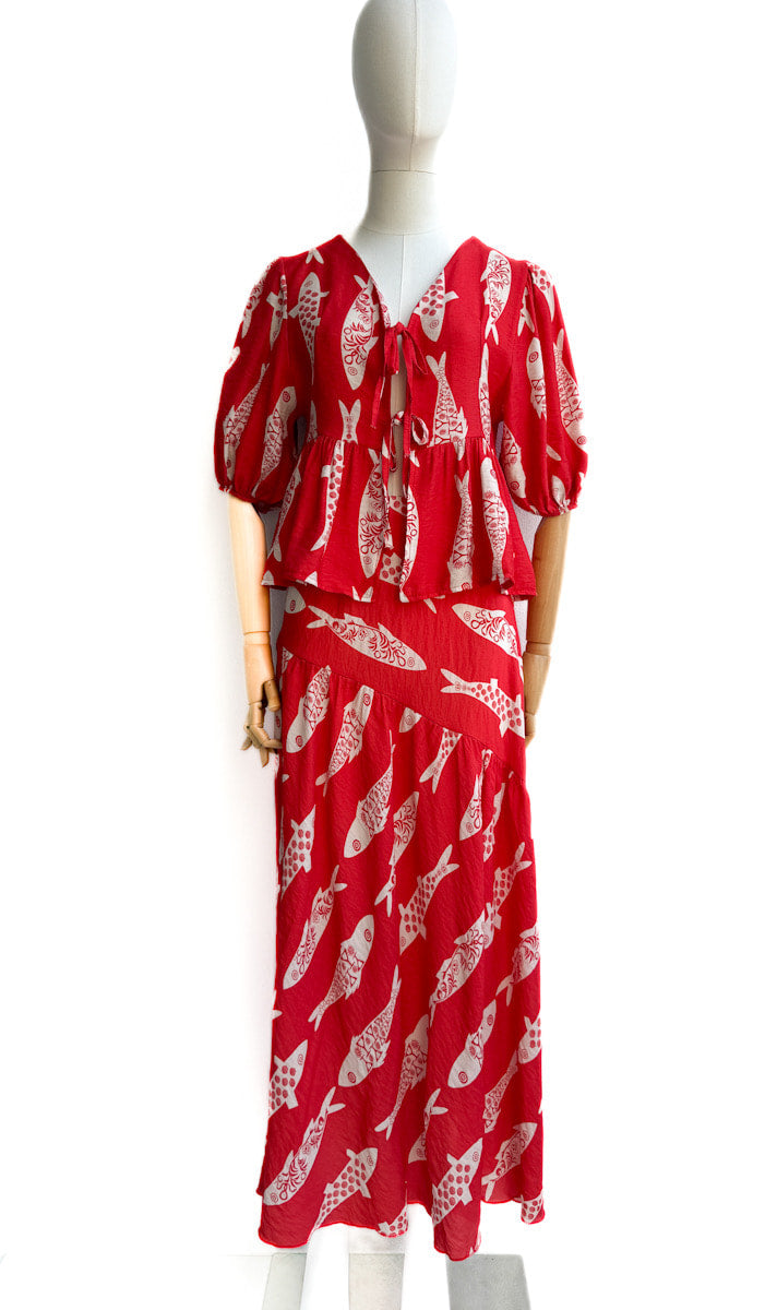 Conjunto peces rojo