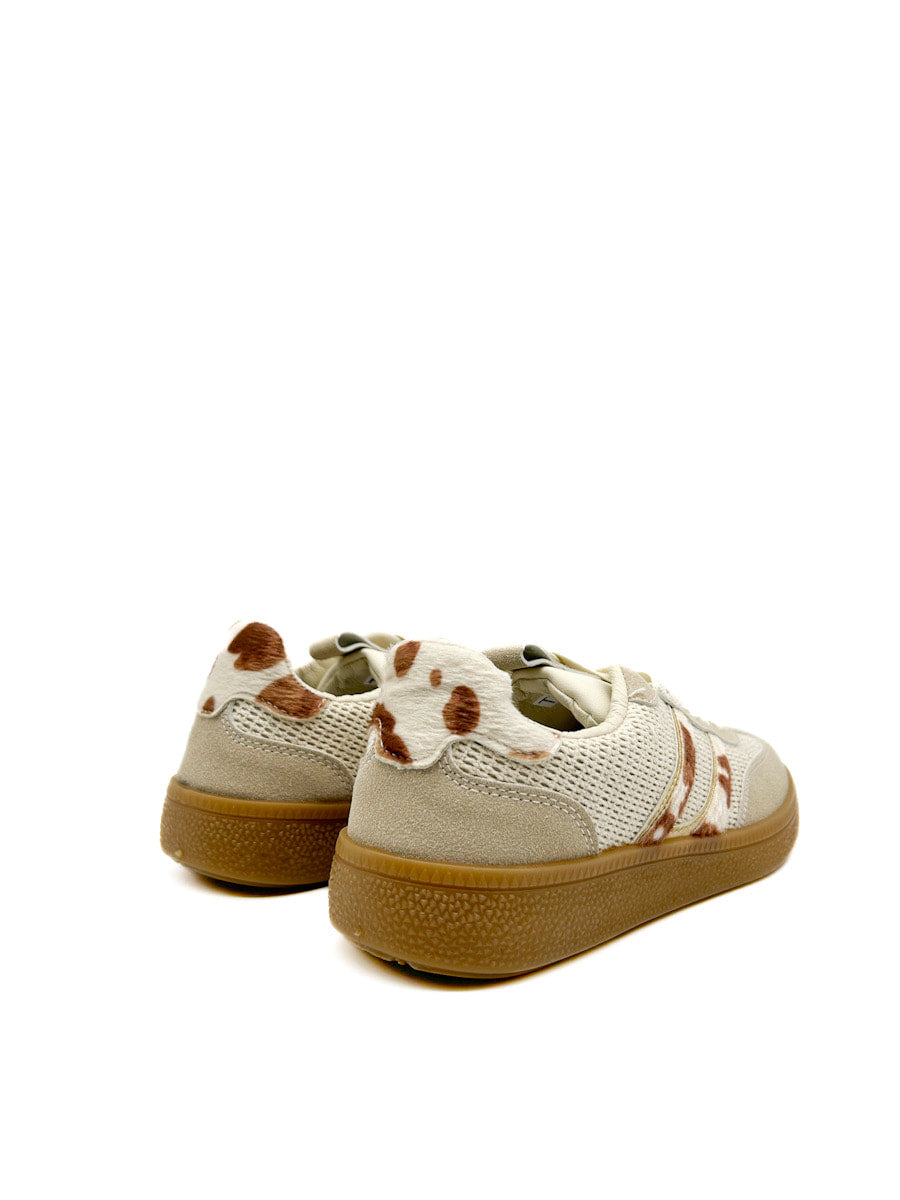 Zapatilla deportiva retro con estampado de piel de vaca