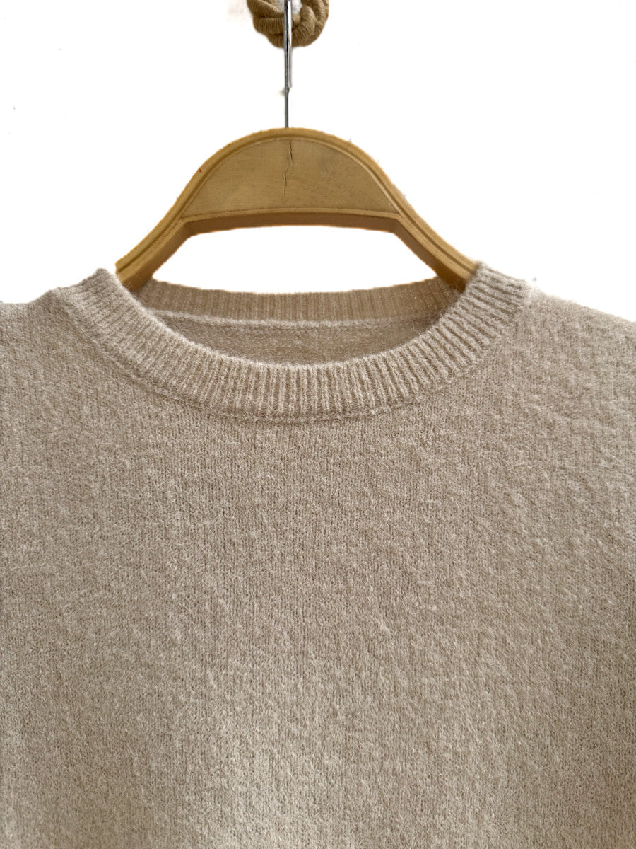 Suéter de Punto con Volantes en los Hombros - Elegancia y Comodidad